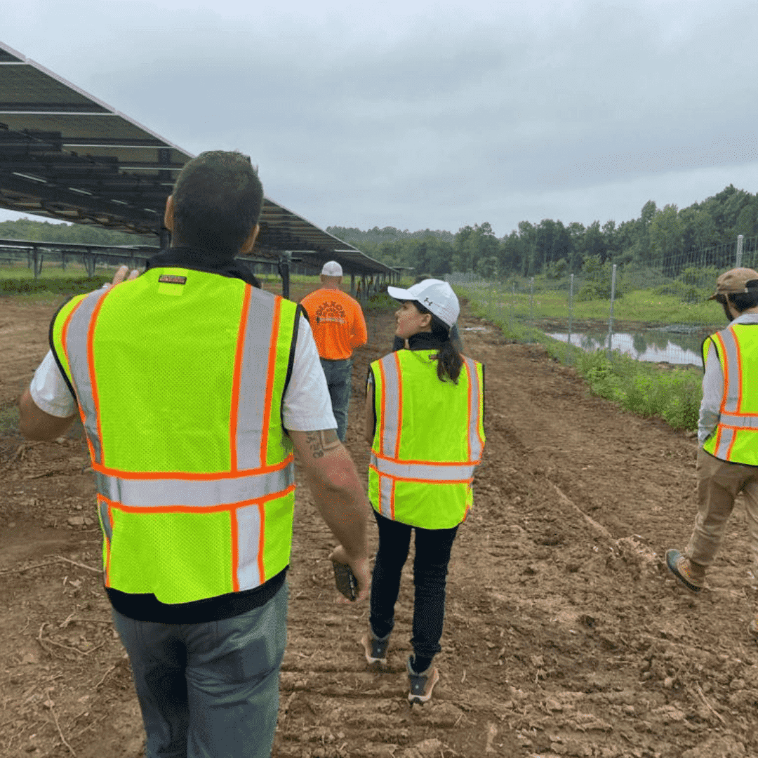 ClearPath Energy team on site walk of community solar farm